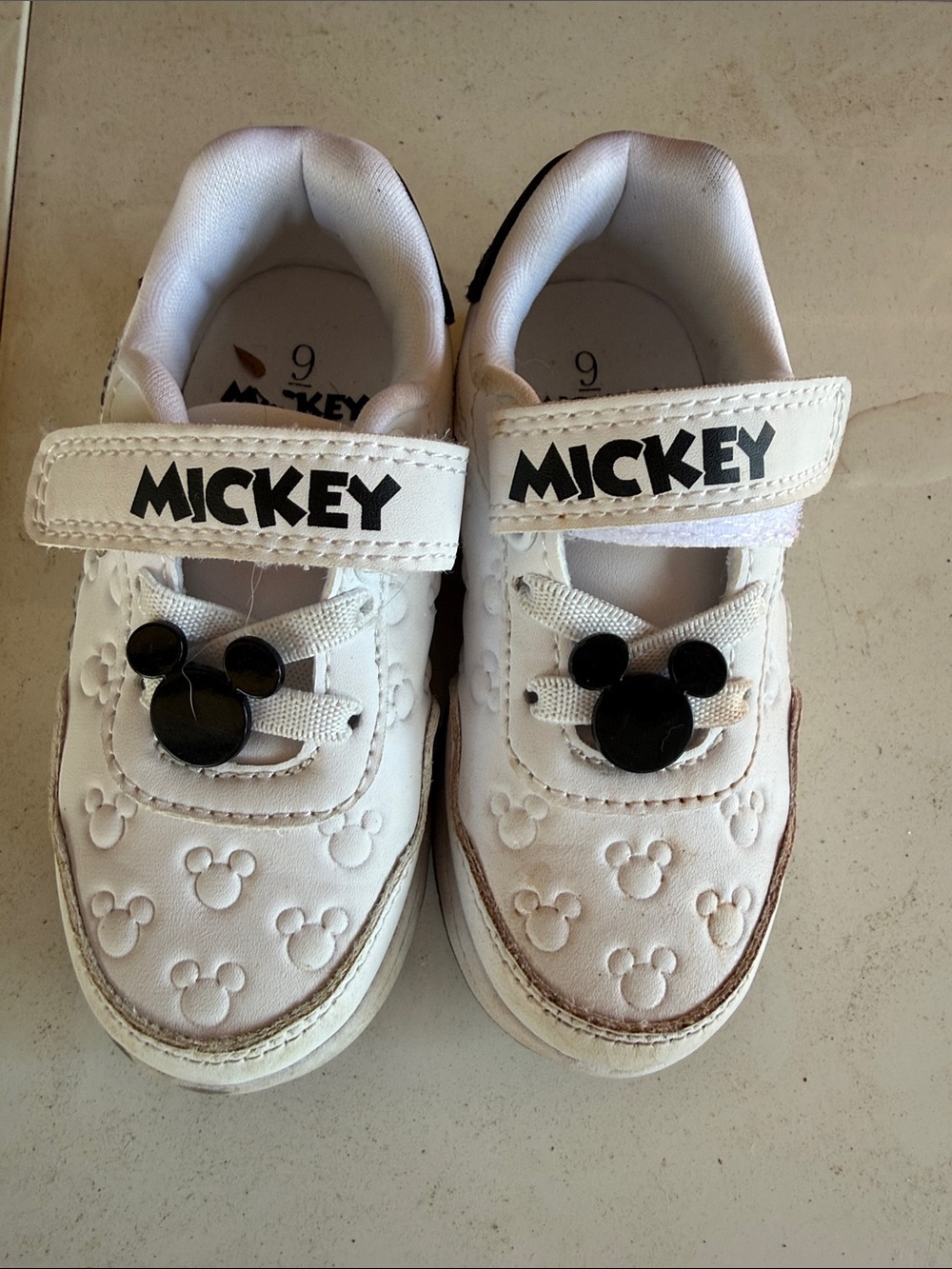 Kids White Sneakers with Black Charm